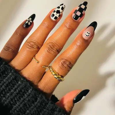 Black and white mismatched nail art 