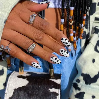 Minimalist cow print manicure