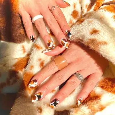 Coffee milk cow print nails