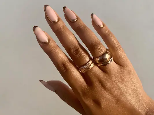 Gold half-moon cuticle and tip nail design