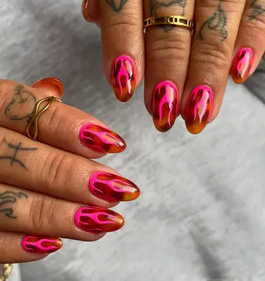 Tortoiseshell nails with hot pink flames. 