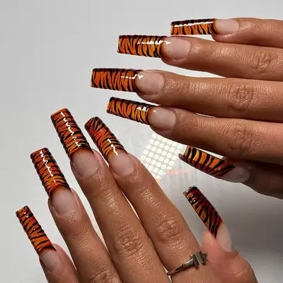 long orange jelly tiger print square-shaped nails