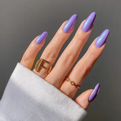 Purple chrome nails with an iridescent blue shift