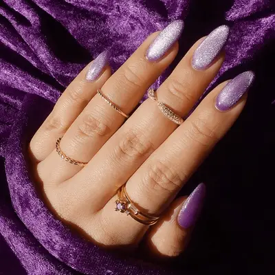 Close up of a purple crushed velvet manicure