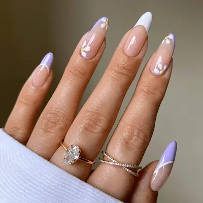 A purple French manicure with daisies