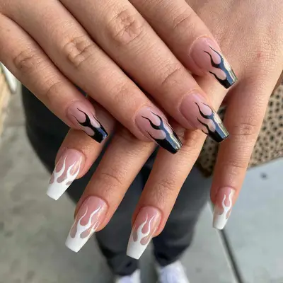 Nude square-shaped nails with black and white flame tips