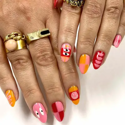 pink and orange checkerboard accent nail