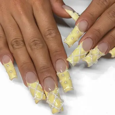 yellow French tips with pearl checkerboard prints