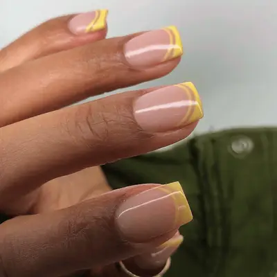 Acrylic nails with checkerboard tips