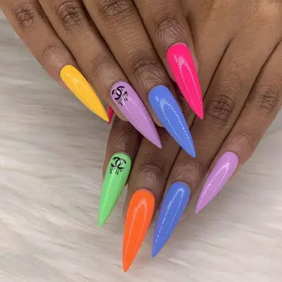 Acrylic nails with colorful Chanel detail