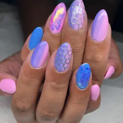 Acrylic nails with pink and purple mermaid pattern