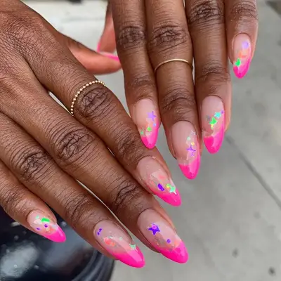 Acrylic nails with pink tips and star stickers