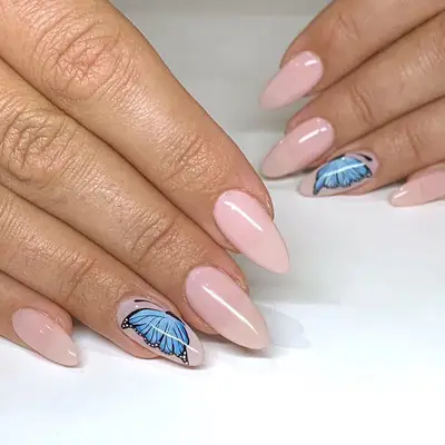 Acrylic nails with butterfly on one nail 