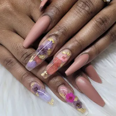 Acrylic nails with floral detail