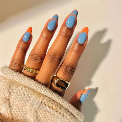 French manicure with blue and orange.