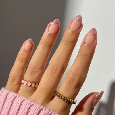 Double French manicure with dripping pink cat eye tips.