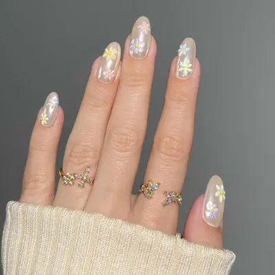Vanilla chrome manicure with pastel floral design