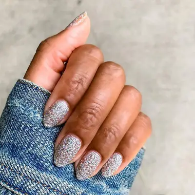 Iridescent silver glitter manicure