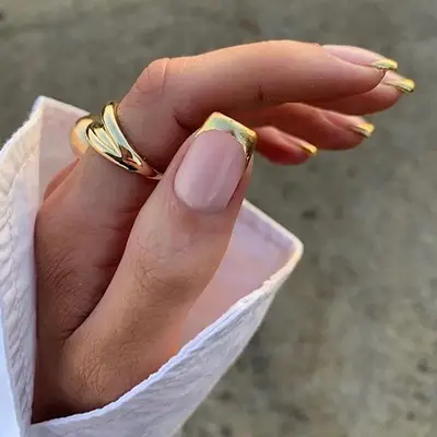 Gold-plated French manicure with gold rings