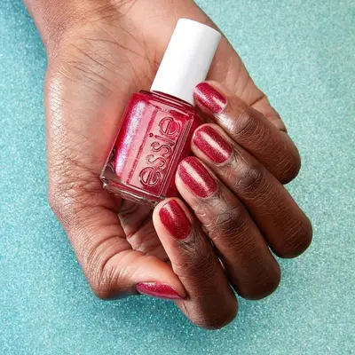 Nails with red glitter polish