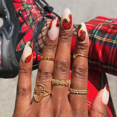 Half-red tartan plaid, half-light neutral manicure