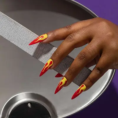 red nails with yellow flames