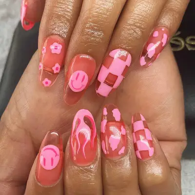a pink jelly manicure with bubblegum mismatched nail art
