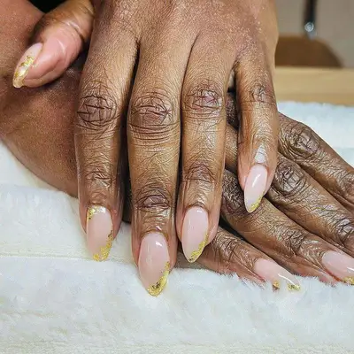 nude nails with gold foil