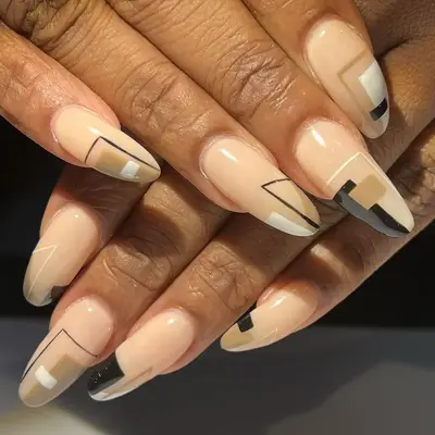 woman with neutral abstract manicure