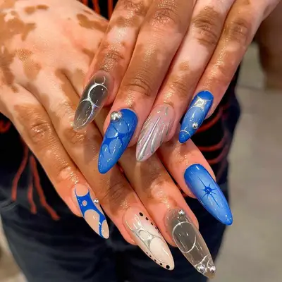 mismatched chrome and blue long manicure