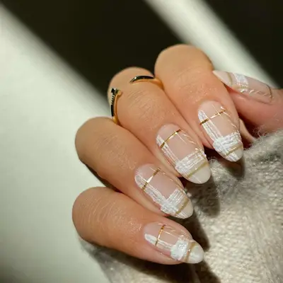white and gold plaid nails