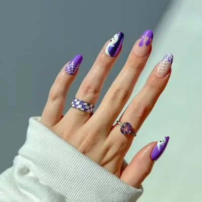 Purple halloween nails.