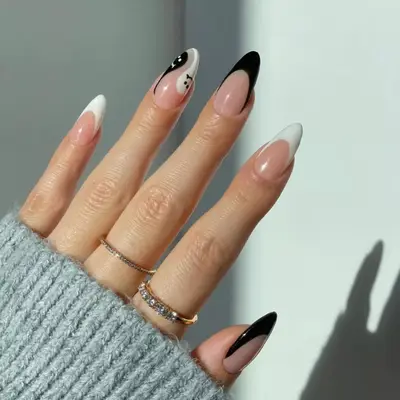 Tortoise shell manicure with white ghost accents. 