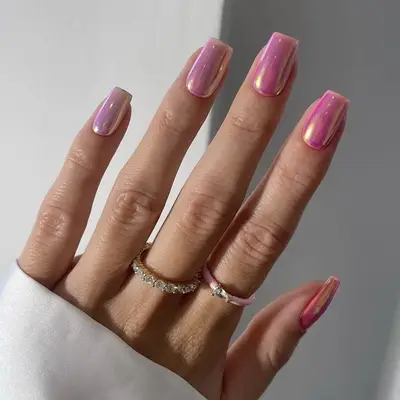 chrome pink nails closeup