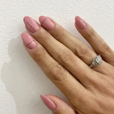 pink manicure black lines