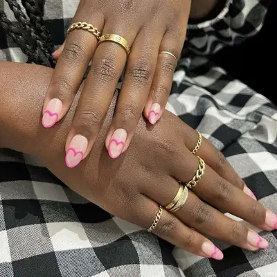 pink heart nail art closeup