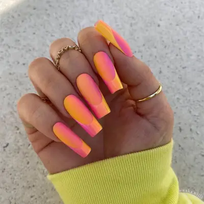 orange and pink ombre nails with glossy french tips