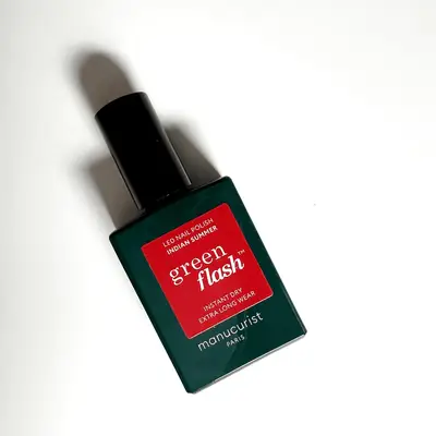 Manucurist Green Flash LED nail polish bottle shot in shade Indian Red