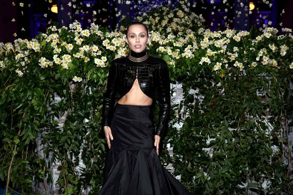 Miley Cyrus poses at the 2025 Met Gala.