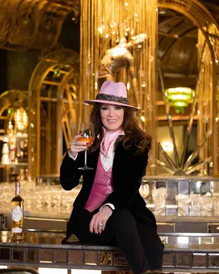 Lisa Vanderpump holding a drink