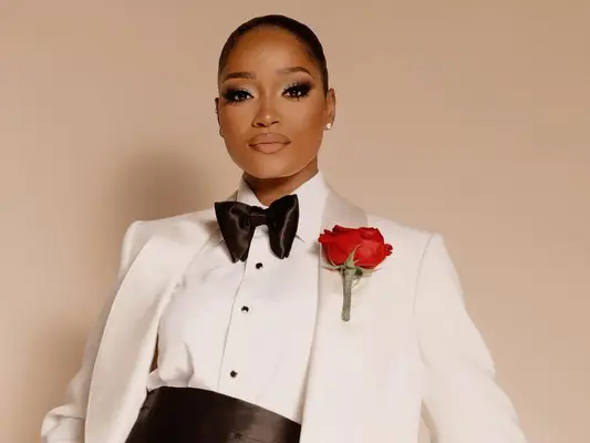 keke palmer in a white tuxedo