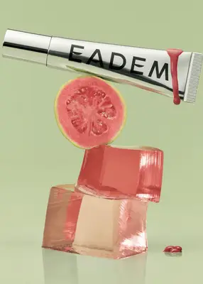 Elsa Hosk wearing Guava Pink and sitting in a Guava Pink chair.