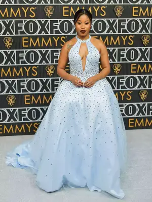 Dominique Fishback wears a blue bedazzled ballgown to the January 2024 Emmy Awards