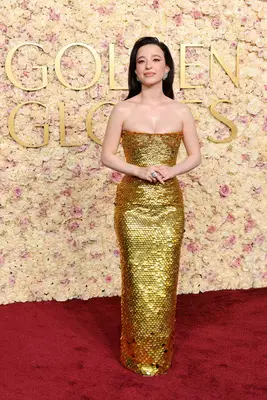 Mikey Madison in a strapless gold gown at the 2025 Golden Globe Awards