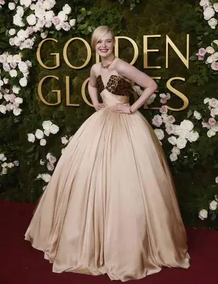 Elle Fanning at the 2025 in a strapless ball gown Golden Globe Awards 