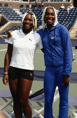 Venus and Serena Williams wearing beads in their hair in 1998