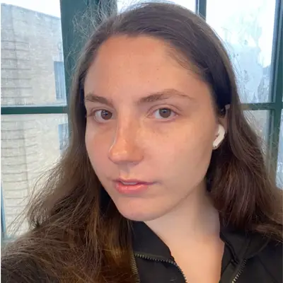 woman taking selfie with clear skin