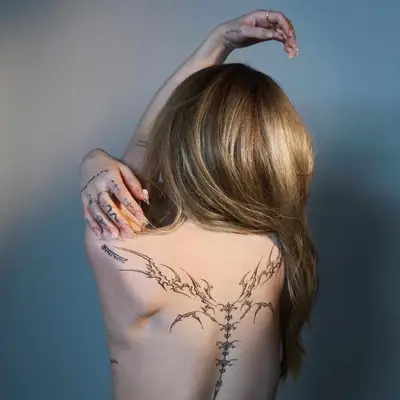 Dove Cameron with blonde hair