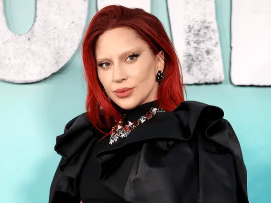 Lady Gaga with red-colored hair. 