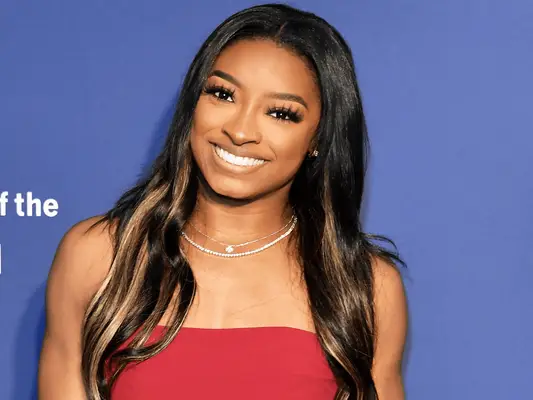 Simone Biles with long hair. 
